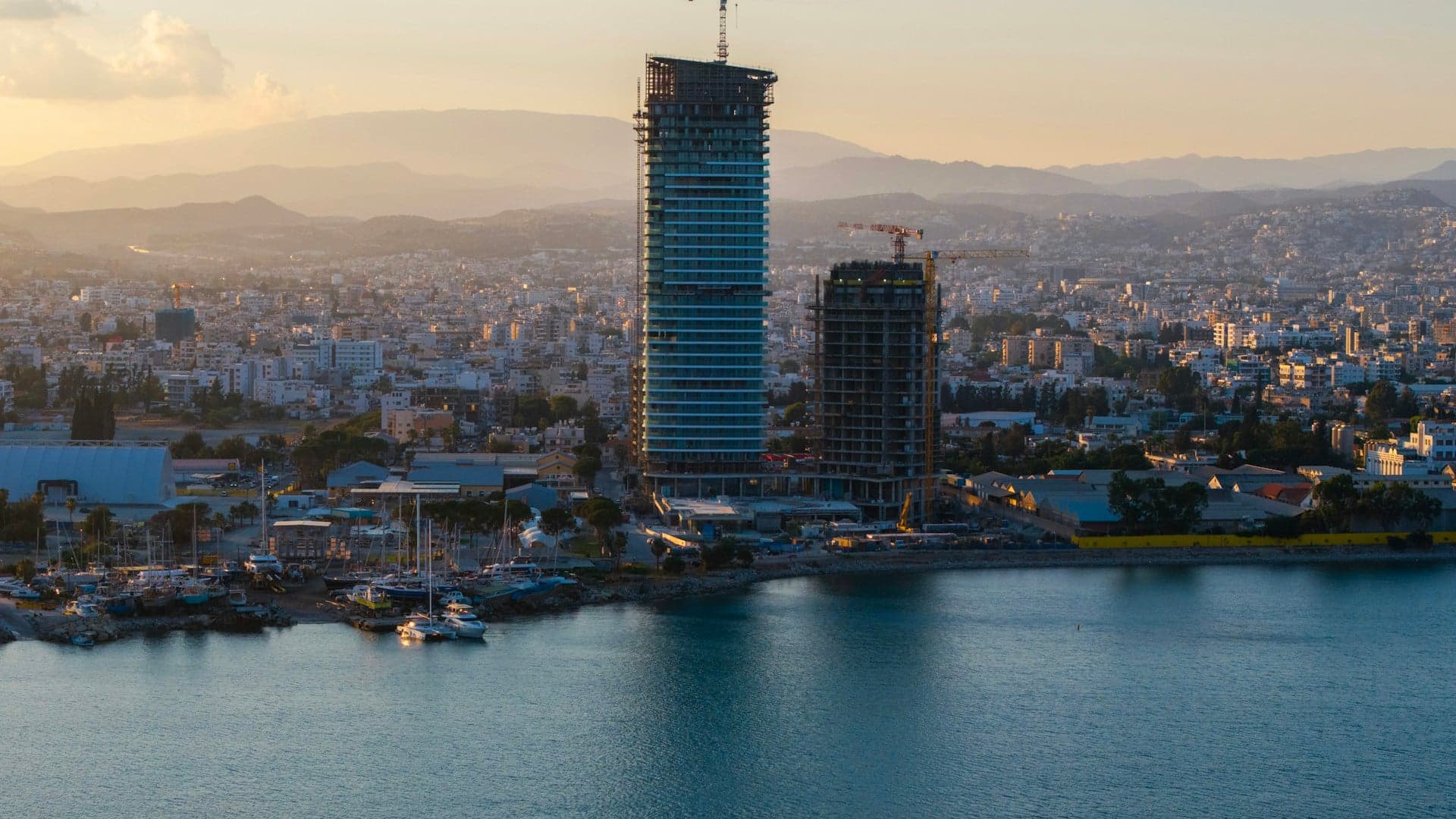 Limassol seafront and high-rise towers at dusk, Cyprus